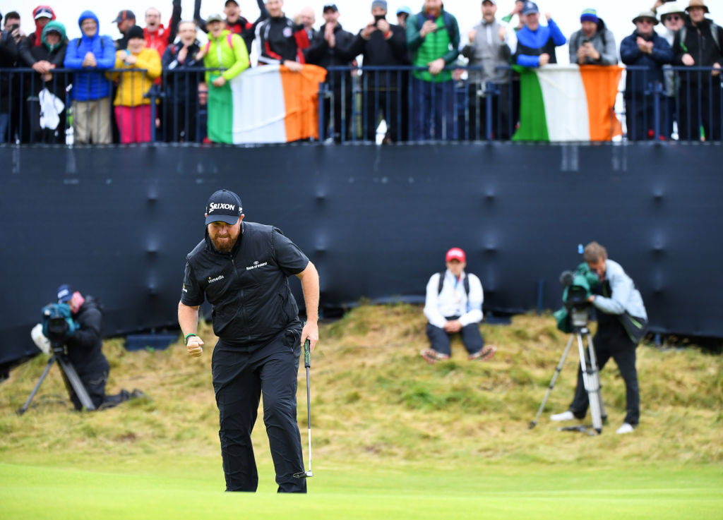 Shane Lowry fist pumping after holing a putt